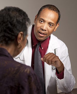 Health care provider talking to patient..