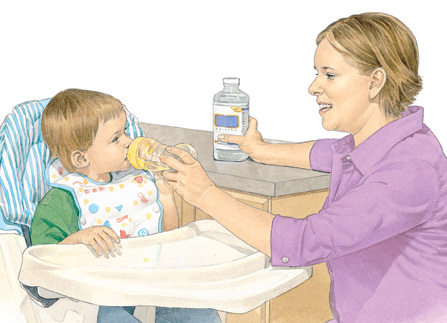 Image of a woman administering an oral rehydration solution to a small child in a highchair using a baby bottle.