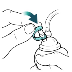 Close-up of bulb opening, showing cap being closed.